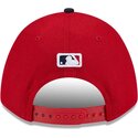new-era-curved-brim-9forty-m-crown-player-replica-cleveland-guardians-mlb-red-and-navy-blue-snapback-cap