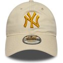 new-era-curved-brim-golden-logo-9twenty-league-essential-new-york-yankees-mlb-beige-adjustable-cap